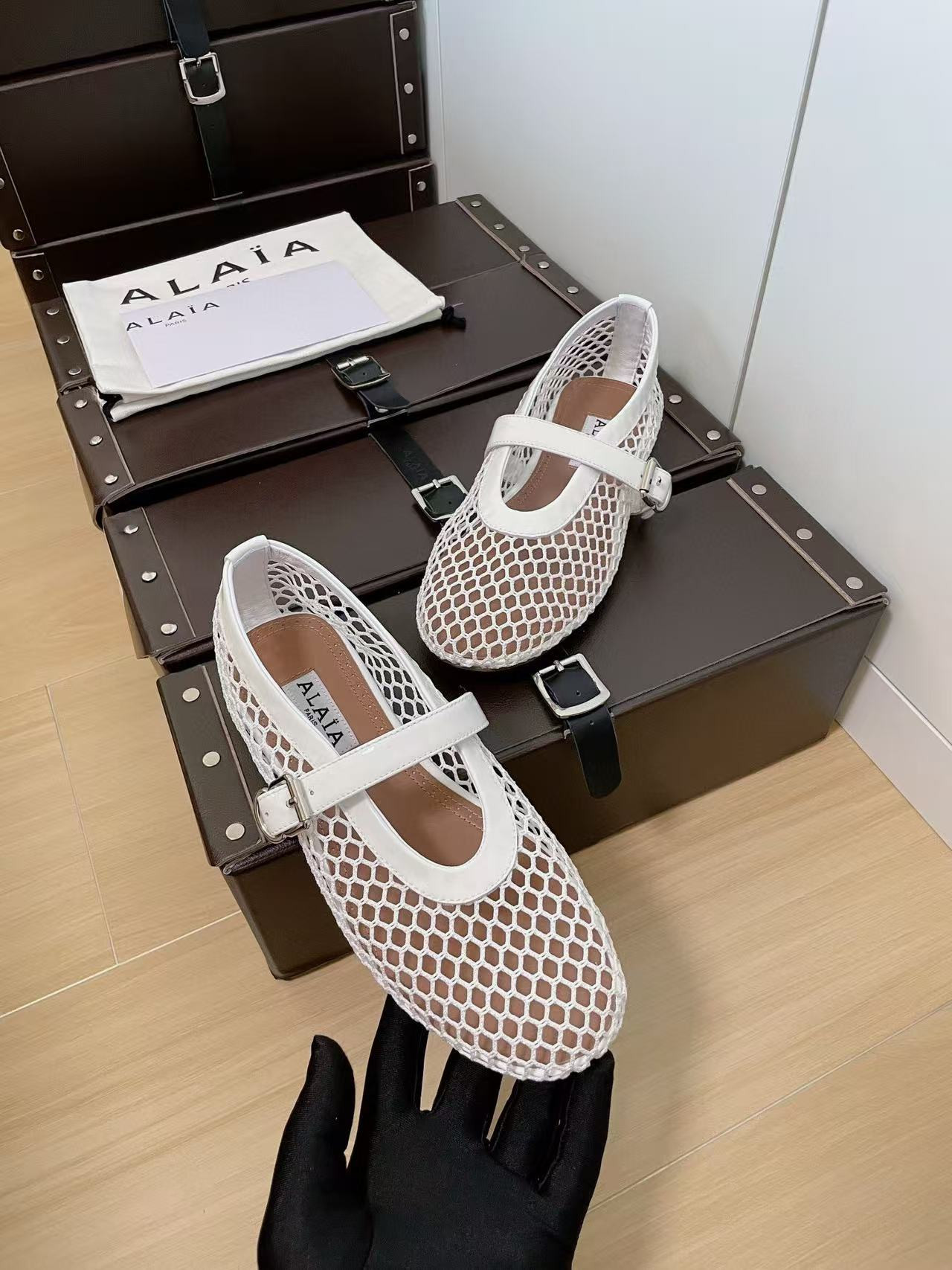 UA ALAÏA BALLET FLATS IN FISHNET