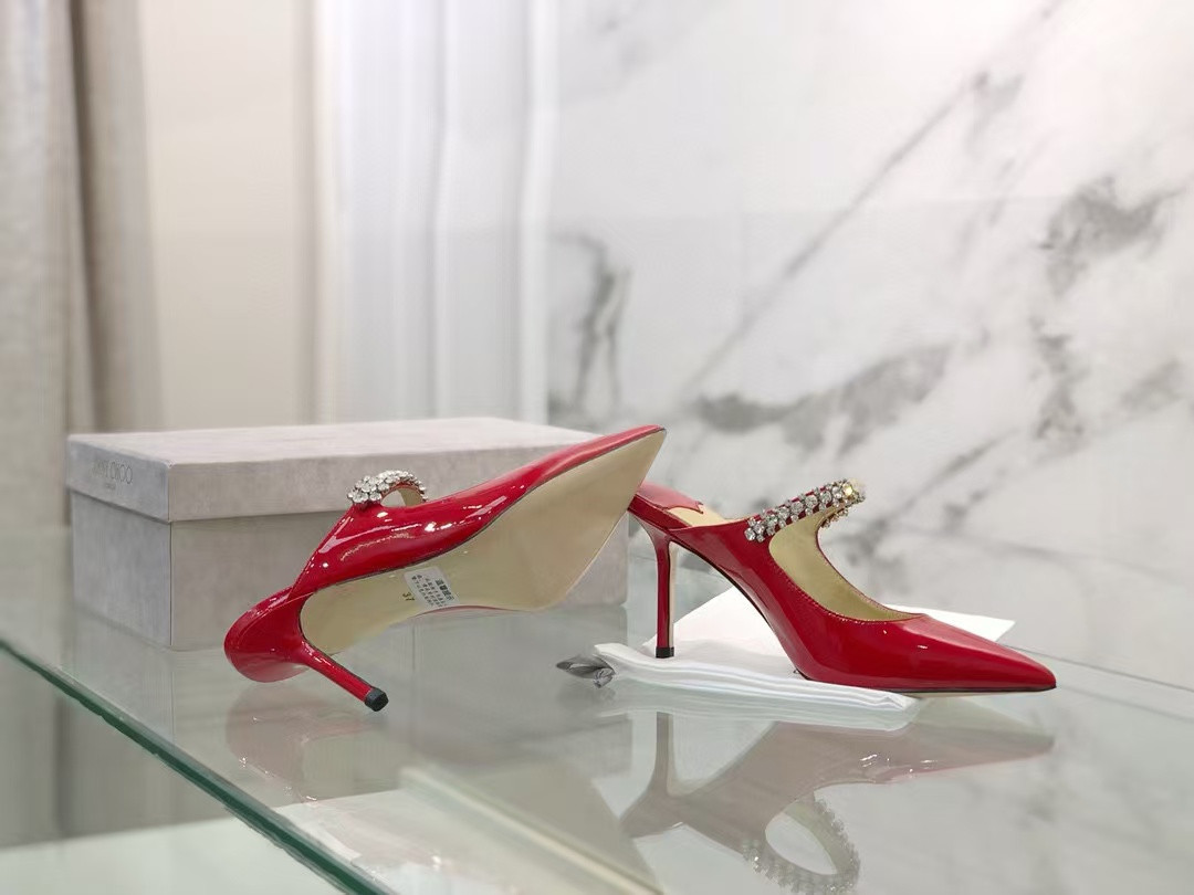 ua Ji*y Ch* mules en cuir bing