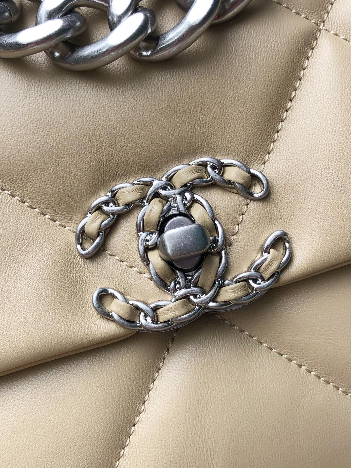 Ch*el 19 handbag shiny leather, gold-tone, silver-tone & ruthenium-finish metal beige 30x20x10cm