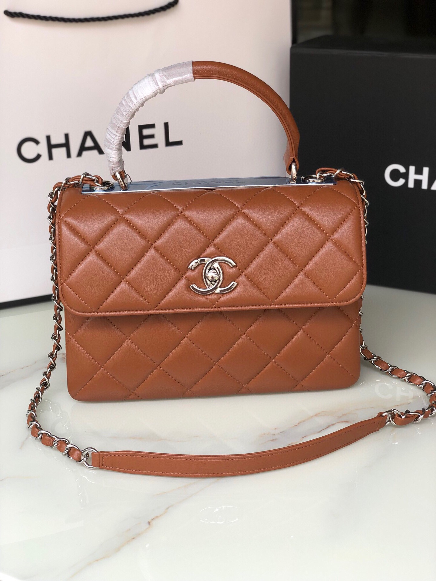 Ch*el flap bag with top handle 6.6 × 9.8 × 4.7 in
