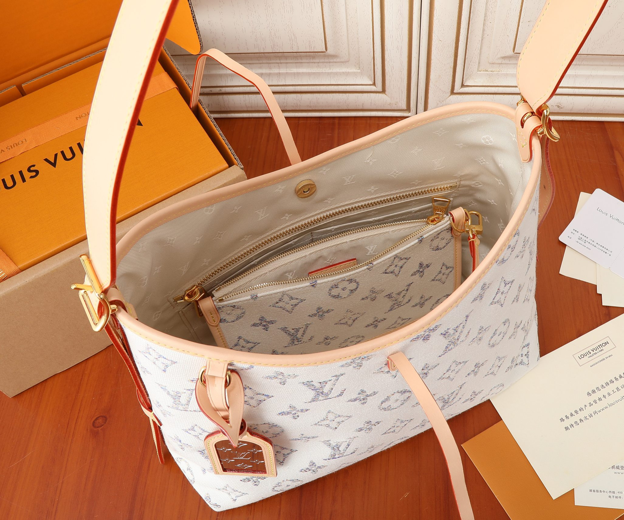 LV CarryAll PM  M24707 11.6x9.4x4.7 inches