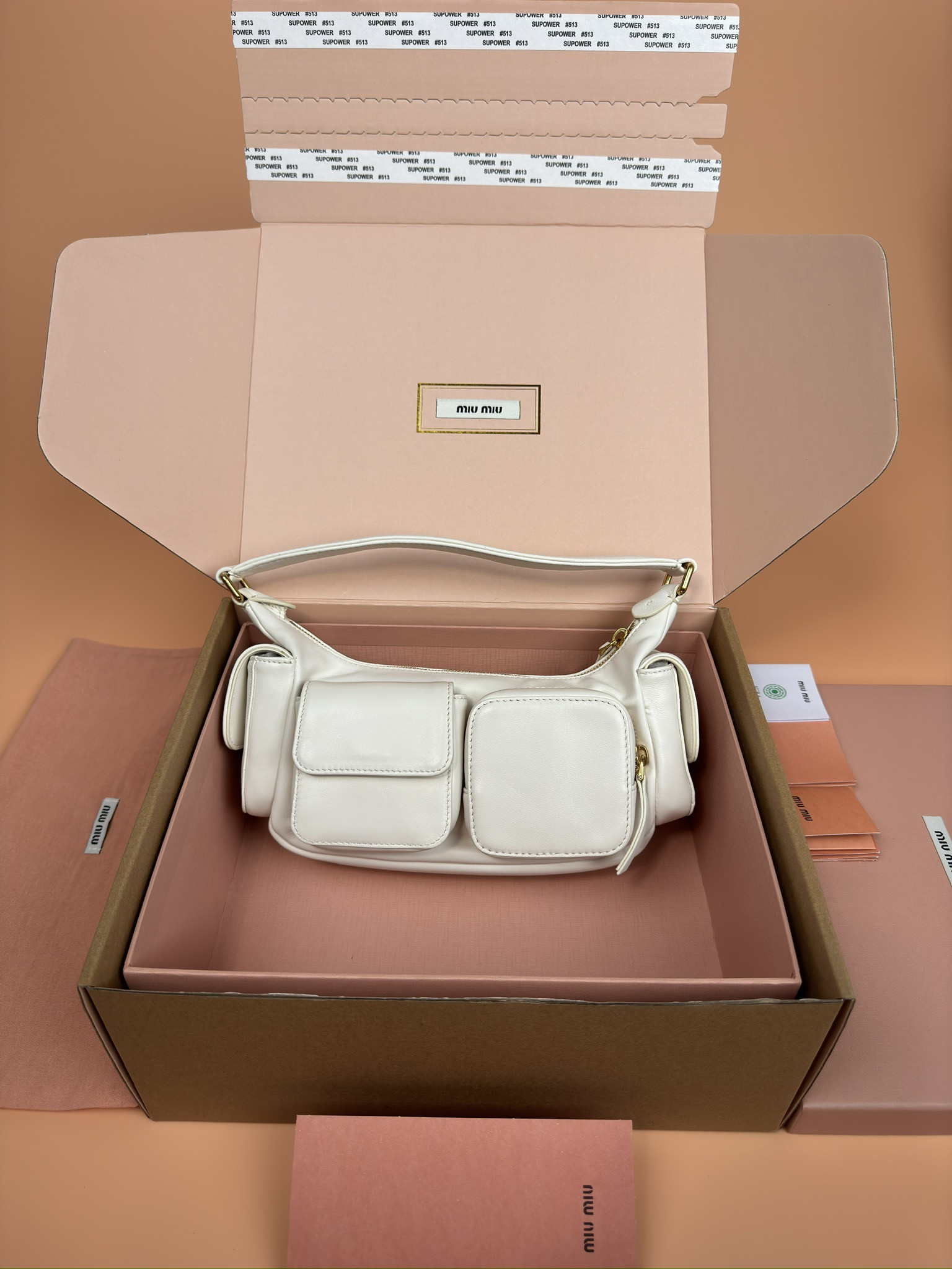 Miu Miu Hobo Nappa leather pocket bag 12x21x6cm